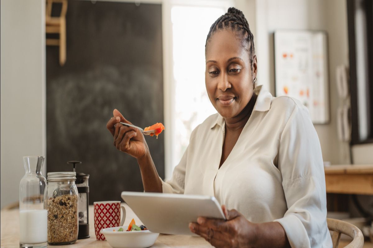 a woman eating and practicing mindful living