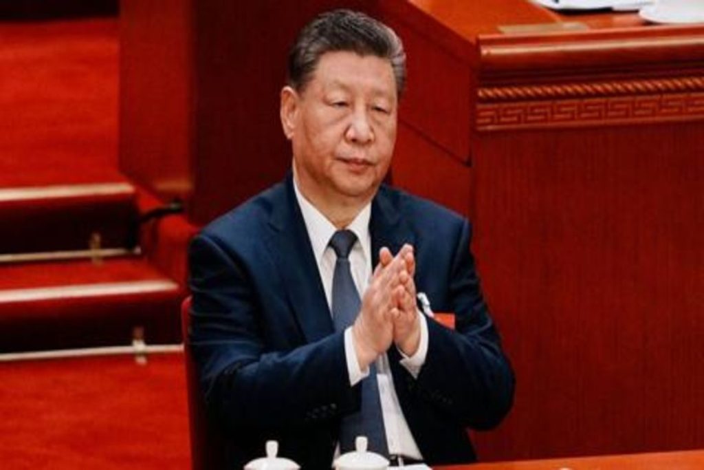 China Approves New Law to Promote Ethnic Unity The president of china clapping hands together