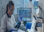 A lady Making use of Artificial Intelligence in a lab