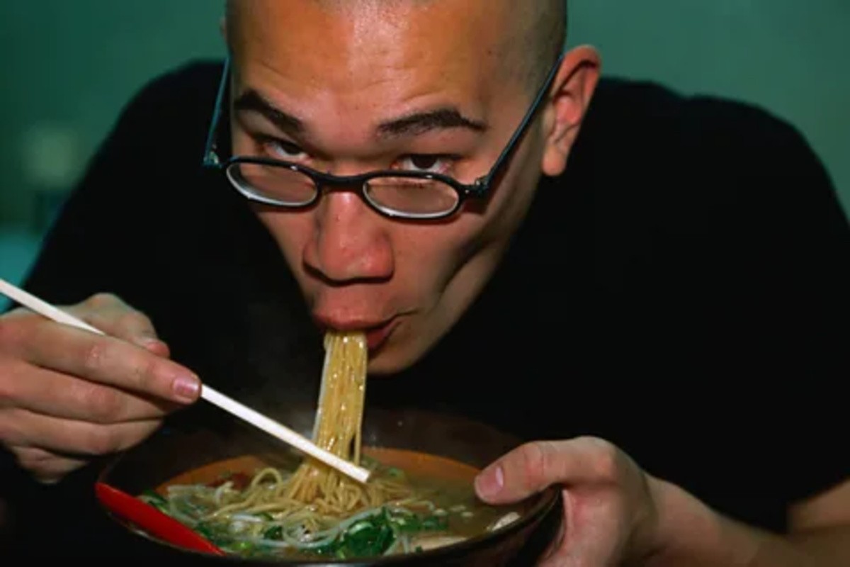 A man slurping
