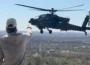 Kid Rock pointing at a military aircraft
