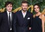 David and Lady Victoria Beckham with son at an event