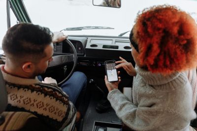 Man and woman using a digital tool
