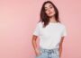 A model on a white shirt and jean trouser