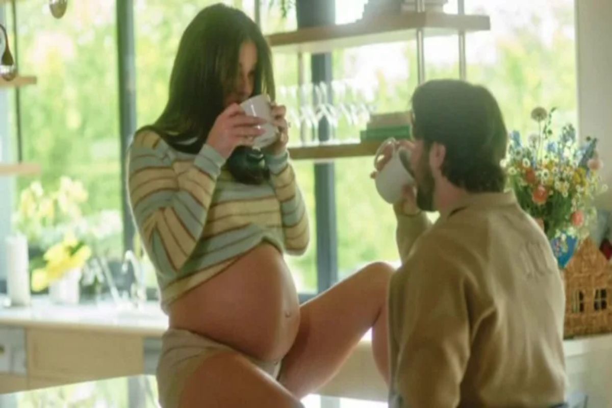 Josh Allen and  Hailee Steinfeld showing off her baby bump