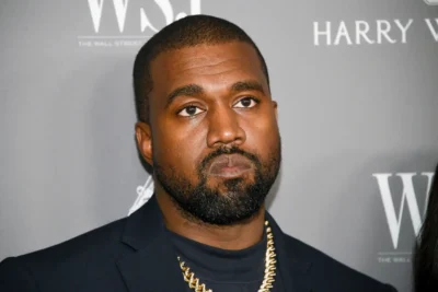 Kanye West posing for a picture