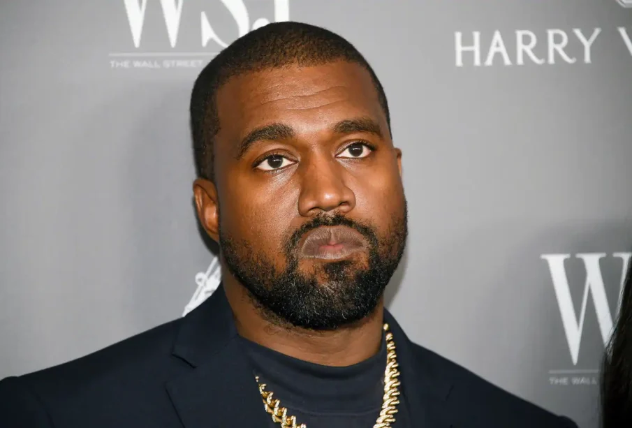 Kanye West posing for a picture