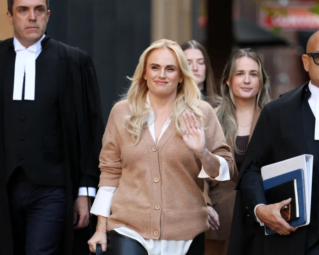 Rebel Wilson with lawyers by her sides