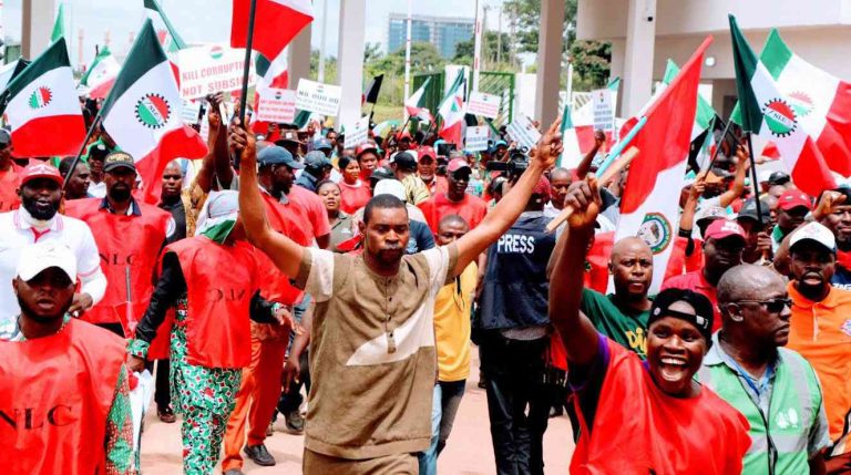 NLC and TUC leaders addressing workers during a gathering over insecurity concerns and the threat of a nationwide strike in Nigeria.