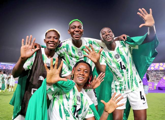 FIFA Ranking: Super Falcons Retain Africa Top Spot in Latest FIFA Ranking Ahead of 2026 WAFCON Super Falcons players celebrating on the pitch after retaining Africa’s top spot in the latest FIFA rankings ahead of the 2026 WAFCON tournament.