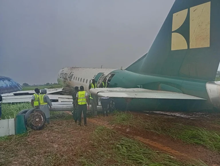 68 Passengers Escape Unhurt After Enugu Airlines Plane Crash Landing Incident at Benin Airport Enugu Airlines aircraft on the runway at Benin Airport after a crash landing as emergency responders secure the scene.